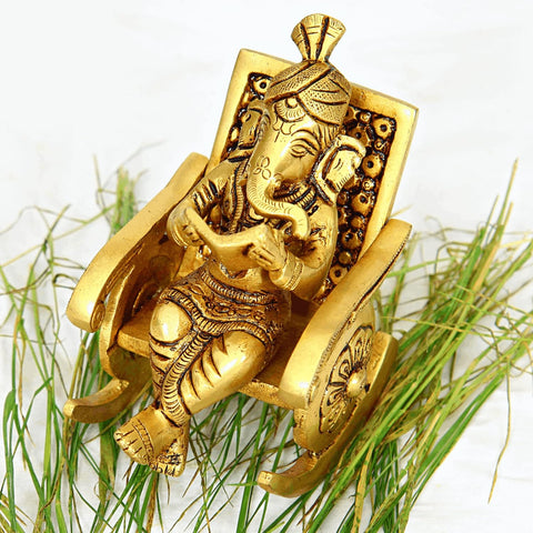 Divine Artz | Premium Chair Ganesha Idol | Rocking Chair Ganesha Idol | Heavy Rocking Chair Ganesha Brass, 675g, Height 10.5 CM, Gold Colour, 1 Piece